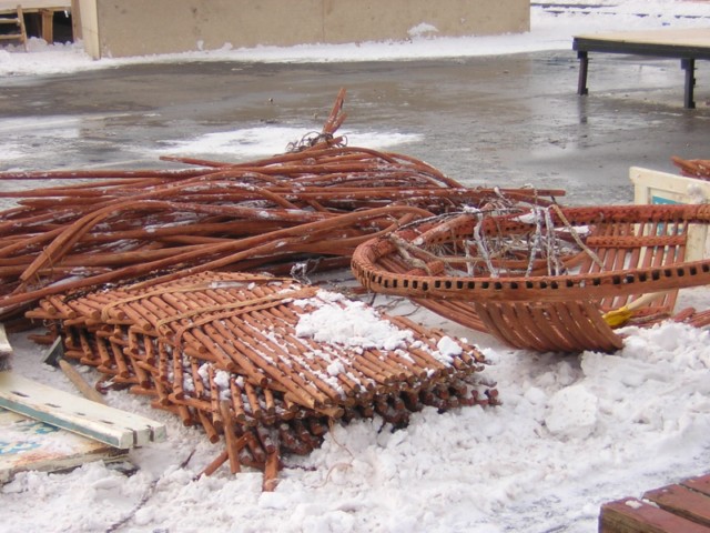 The materials all laid out. Believe it or not, this is all you need (except for the outside covering). The <em>shanyrak</em> or roof and the wall frames.