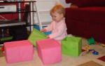 Anna Enjoying Reordering Her Little Toy Boxes