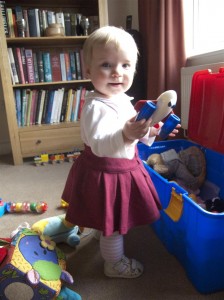 Anna Sorting Her Toybox