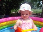 Playing In Her Paddling Pool