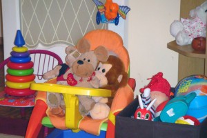 Monkey & Teddy Snuggle Together On Anna's Chair