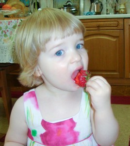 Enjoying A Home Grown Strawberry